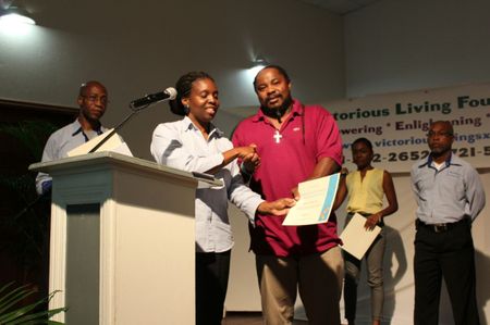 Ken Crossely receiving certificate